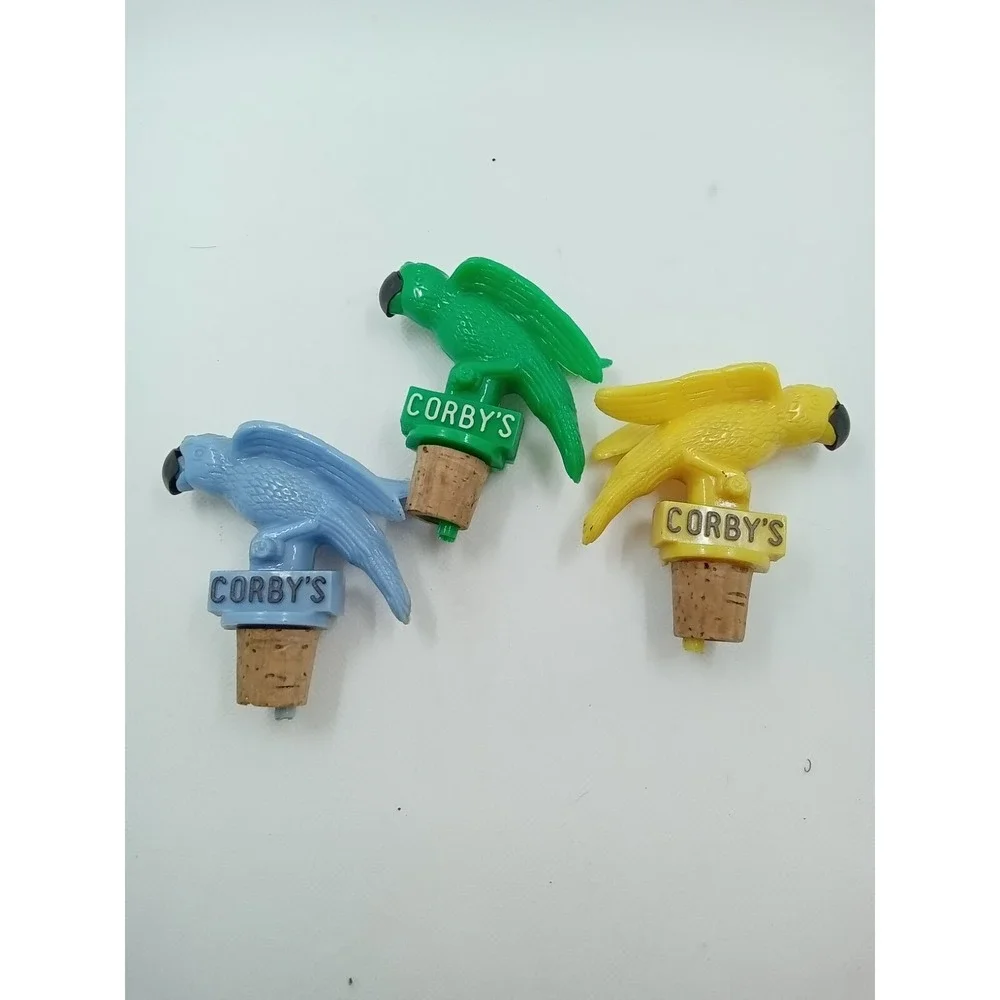 3 Corby's Whiskey Cork Pours Parrots, Blue one may‎ have been repaired.
